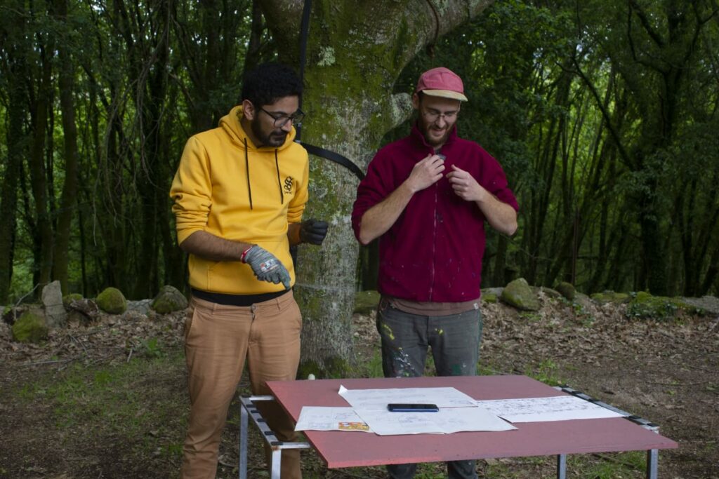 Cuco and Anis deciding on the piece to be painted at Anceu Coliving